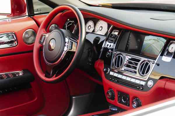 Unique Rolls Royce Dawn in red color is available for rent