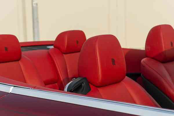 Unique Rolls Royce Dawn in red color is available for rent
