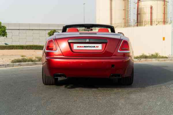 Unique Rolls Royce Dawn in red color is available for rent