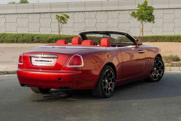 Unique Rolls Royce Dawn in red color is available for rent
