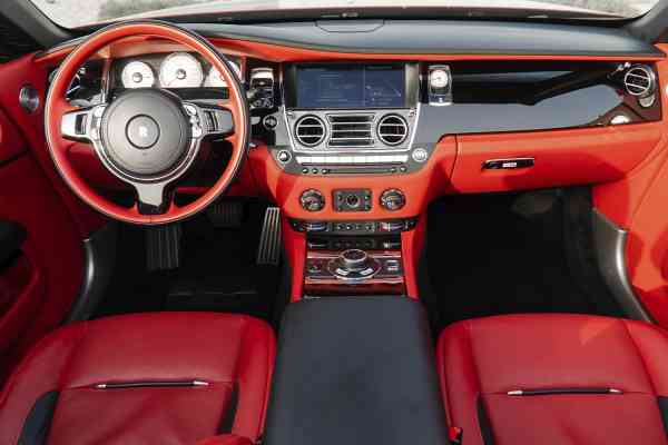 Unique Rolls Royce Dawn in red color is available for rent