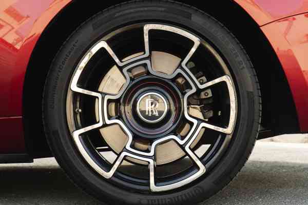 Unique Rolls Royce Dawn in red color is available for rent