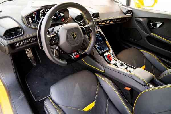 Rent Yellow Lamborghini Huracan Evo in Dubai
