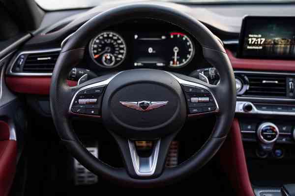 Rent black Genesis G70 in Dubai