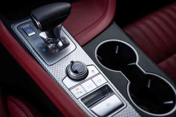 Rent black Genesis G70 in Dubai