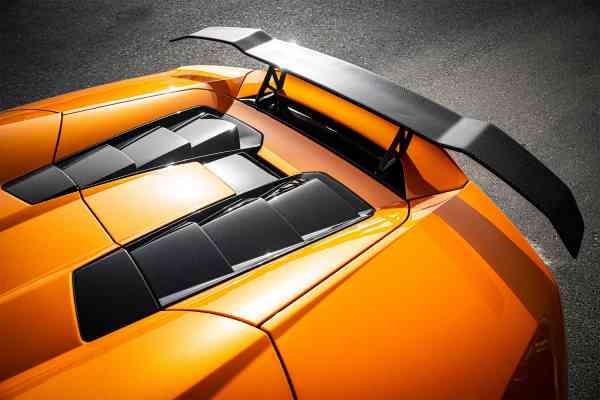 Rent Orange Lamborghini Huracan Evo Spider in Dubai