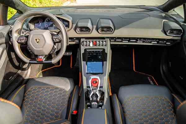 Rent Orange Lamborghini Huracan Evo Spider in Dubai