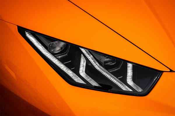 Rent Orange Lamborghini Huracan Evo Spider in Dubai