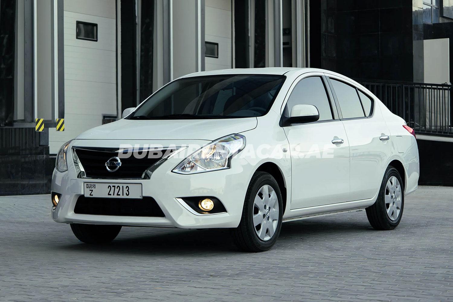 White Nissan Sunny available for rent in Dubai
