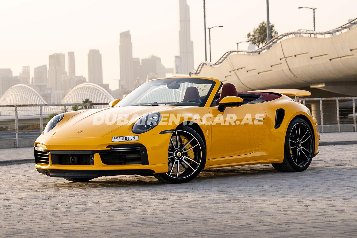 Yellow Porsche 911 Turbo S available for rent in Dubai